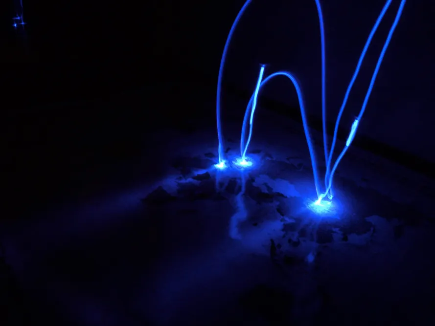 Light arcs crossing the photographed map surface
