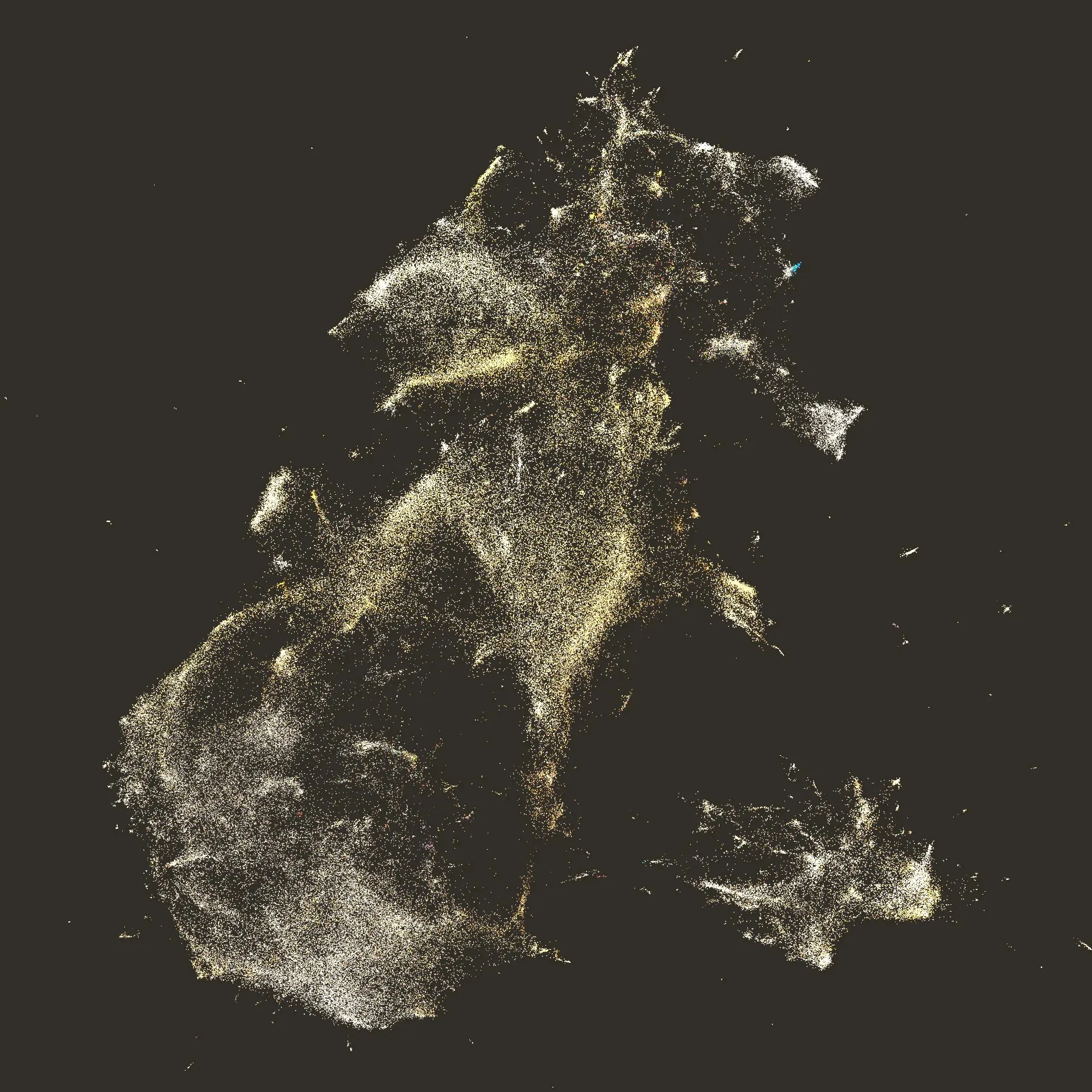 The Harvard Art Museums collection as one PixPlot map: more than 200,000 tiny points in warm white and ochre on a dark brown-gray background, spreading into a nebula of dense lobes and streaks with a few loose fragments drifting at the edges